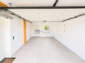 Garage mit Stellplatz davor - 