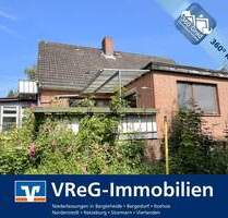 Vollunterkellertes Einfamilienhaus mit Einliegerwohnung und zwei Garagen - Zarpen