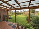 Gartensicht von der Terrasse - Doppelhaushälfte mit 90,90 m² in Rhauderfehn / Burlage zum Kaufen