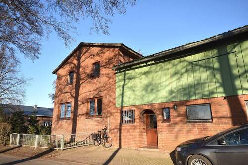 Seitenansicht - Mehrfamilienhaus, Wohnhaus mit 145,30 m&sup2; in Moordiek zum Kaufen