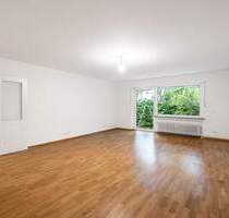 AIGNER - Charmante Erdgeschosswohnung am Athener Platz: Wohnen auf einer Ebene mit privatem Garten - München Untergiesing-Harlaching