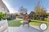 Gartenidylle mit Spielbereich und Platz für Familie - 