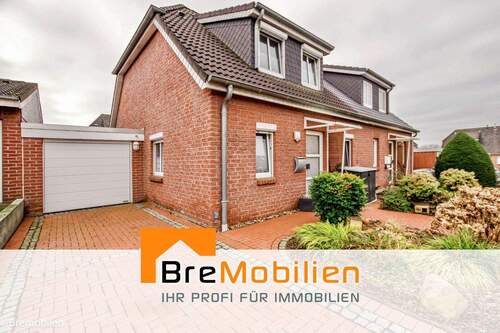 Vorderansicht - Attraktive Doppelhaushälfte in Oyten mit Garage und kleinem Pool