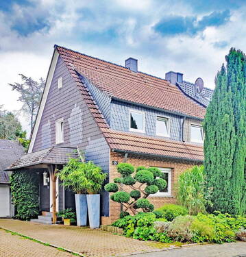 Straßenansicht - Von privat ohne Makler: Traumhaftes Zuhause mit Gartenparadies in ruhiger Siedlung von Herne-Süd
