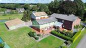 Vogelansicht - 5 Zimmer Mehrfamilienhaus, Wohnhaus zum Kaufen in Hartenholm / Voßhöhlen