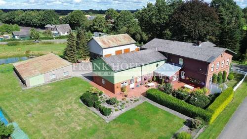 Vogelansicht - 5 Zimmer Mehrfamilienhaus, Wohnhaus zum Kaufen in Hartenholm / Voßhöhlen