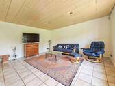 Wohnzimmer im EG - Einfamilienhaus mit 256,00 m&sup2; in Münsterdorf zum Kaufen