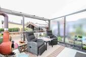 Überdachte Terrasse mit Kamin - 