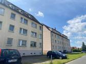 strassenseitiger Blick zu dem MFH - 3 Zimmer Etagenwohnung in Wurzen