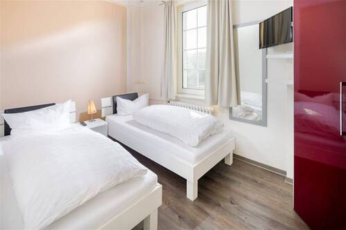  Schlafzimmer EG - Mehrfamilienhaus, Wohnhaus in Norderney zum Kaufen