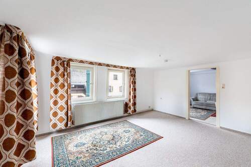 Wohnzimmer EG - 7 Zimmer Einfamilienhaus zum Kaufen in Oberriexingen