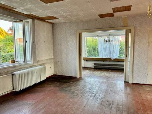 Wohnzimmer Blick zum Wintergarten - 