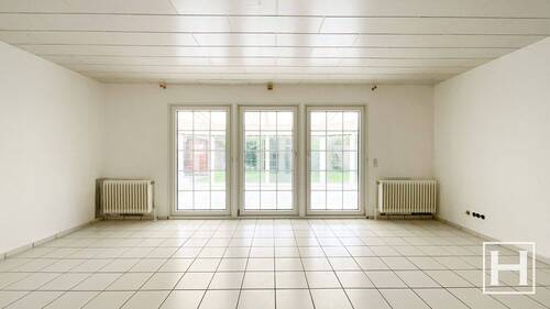 Wohnzimmer - 5 Zimmer Einfamilienhaus zum Kaufen in Kattendorf