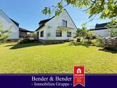 Gartenansicht - Solides Einfamilienhaus auf sonnigem Eckgrundstück mit Garage - nahe Zentrum!