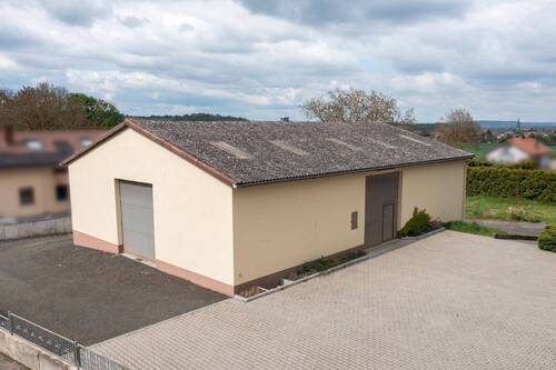 2-geschossige Halle - Einfamilienhaus in Stein-Bockenheim zum Kaufen