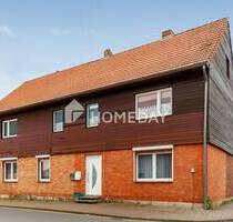Charmantes Mehrfamilienhaus mit zwei Wohneinheiten, Garage, Carport und großzügigem Garten - Lehre Essehof