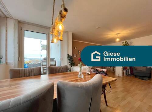 Titelbild mit Banner - Modernisierte 2-Zi-Wohnung mit Tiefgarage und Balkon