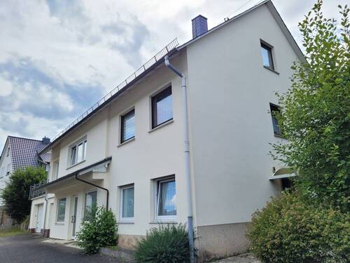 Seitenansicht - Mehrfamilienhaus, Wohnhaus mit 178,00 m² in Niederdreisbach zum Kaufen