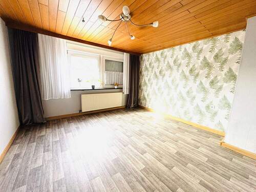 25. Wohnzimmer WE 1.OG links - 