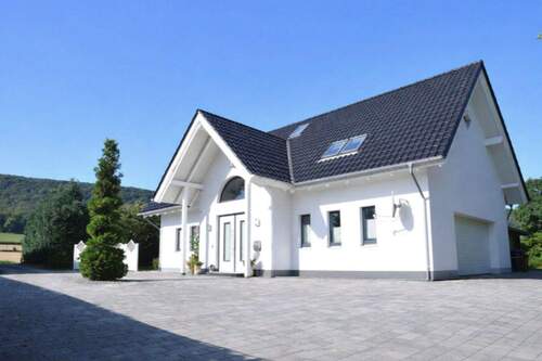 Bild 2 - 5 Zimmer Einfamilienhaus zum Kaufen in Coppenbrügge