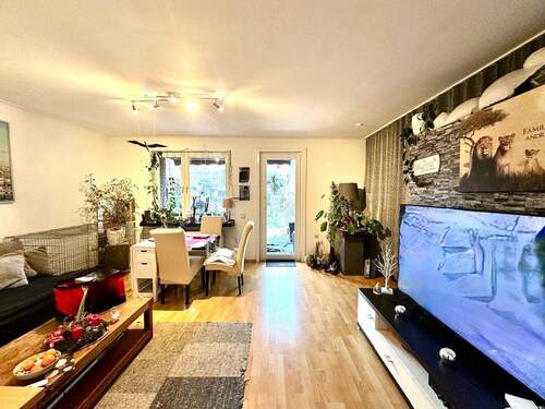 Wohnzimmer Erdgeschosswohnung - Mehrfamilienhaus, Wohnhaus mit 139,90 m&sup2; in Korschenbroich zum Kaufen