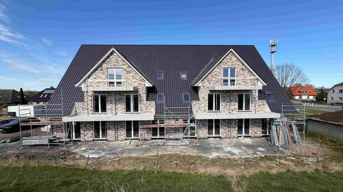 Titelbild - Wohnen am Deich - Neubau-Wohnung in Haseldorf (KfW 40)
