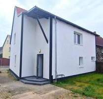 Saniertes Einfamilienhaus mit 2 Garagen, Lagerhalle und einer ehemaligen Gaststätte als Hobby - Torgau Melpitz