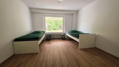 Bild 2 - 1 Zimmer Mehrfamilienhaus, Wohnhaus zum Kaufen in Bielefeld