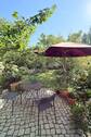Terrasse mit Garten im Frühling - Mehrfamilienhaus, Wohnhaus mit 220,00 m&sup2; in Berlin-Rummelsburg zum Kaufen