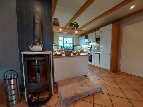 Wohnzimmer EG mit Kaminofen - 