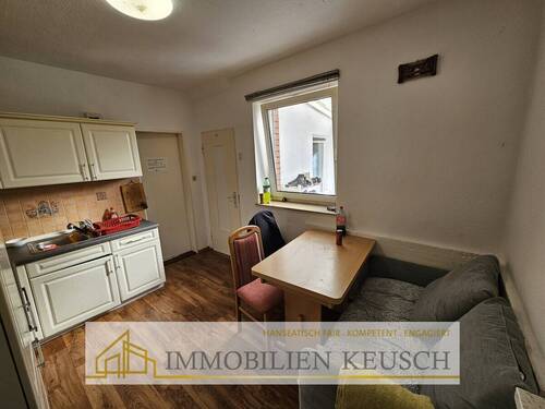 Küche mit Sitzgelegenheit EG - Mehrfamilienhaus, Wohnhaus mit 129,00 m&sup2; in Achim zum Kaufen