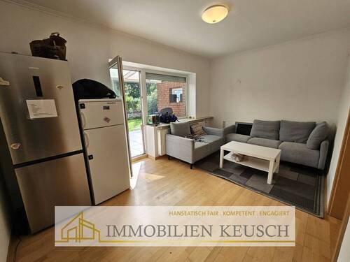 Wohnzimmer mit Zugang zum Garten - 