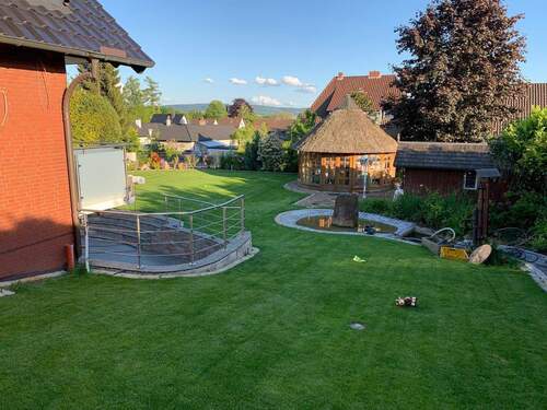 Gartenansicht - 1 Zimmer Mehrfamilienhaus, Wohnhaus in Rinteln