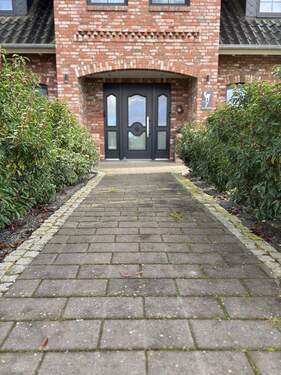 Haus (Eingang) - Einfamilienhaus mit 160,00 m&sup2; in Gyhum zum Kaufen