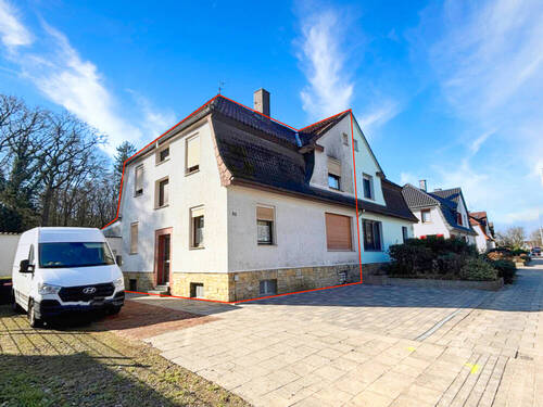 Außenansicht - Doppelhaushälfte mit 2 Wohneinheiten und Garagen in Osnabrück-Eversburg