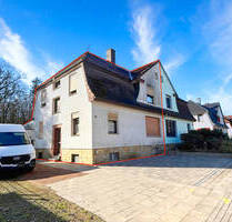 Doppelhaushälfte mit 2 Wohneinheiten und Garagen in Osnabrück-Eversburg