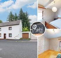 PHI AACHEN - Sanierungsbedürftiges Wohndomizil mit Garage in guter Lage von Herzogenrath-Kohlscheid!