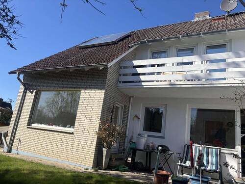 Terrasse Erdgeschoss und Balkon Obergeschoss - 