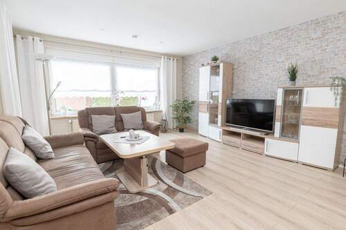 Wohnzimmer - Doppelhaushälfte mit 109,00 m&sup2; in Hemmoor zum Kaufen