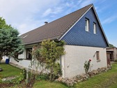 Die Südost-Ansicht der Immobilie - 5 Zimmer Einfamilienhaus in Bergenhusen