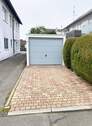 Garage + Stellplatz - 