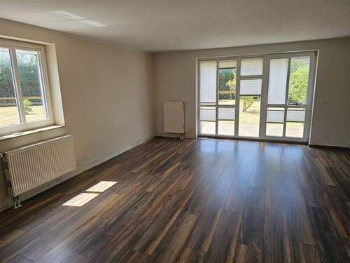 Wohnzimmer - Mehrfamilienhaus, Wohnhaus mit 137,00 m² in Rostock zum Kaufen
