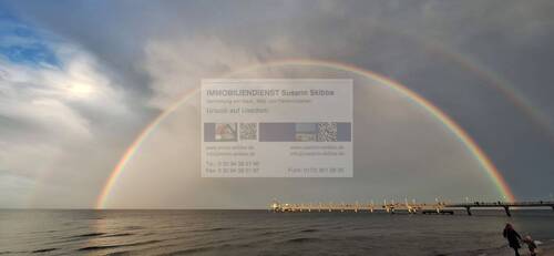 Seebrücke mit Regenbogen - 