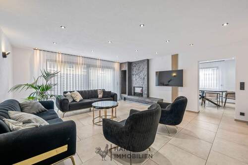 Wohnzimmer - Umfassend modernisiertes Einfamilienhaus mit Top-Ausstattung und Einliegeroption