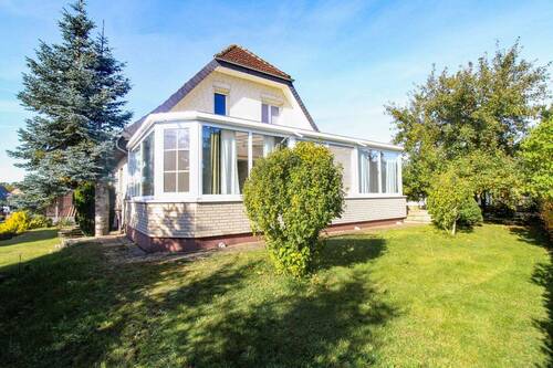 Außenansicht Wintergarten - 8 Zimmer Einfamilienhaus zum Kaufen in Groß Pankow (Prignitz)