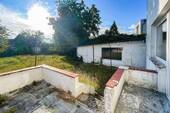 Terrasse_Blick_zur_Garage - 