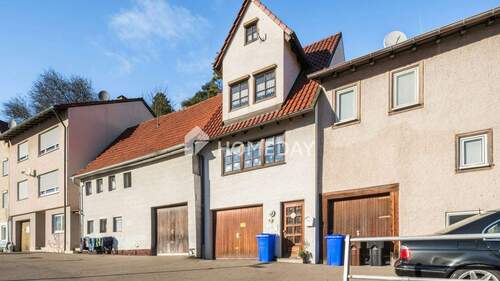 Außenansicht 2 - Gemütliches, kleines Reihenmittelhaus mit Garage, zwei Terrassen und zusätzlich Platz im DG