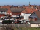 Seitenansicht - 8 Zimmer Mehrfamilienhaus, Wohnhaus zum Kaufen in Wunstorf