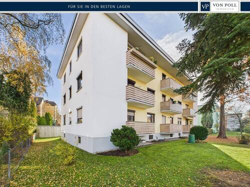 Hausansicht - Gut geschnittene 3,5-Zimmer-Wohnung mit Balkon und Gartenbenutzung in der Bayerwaldsiedlung