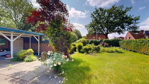 Blick in den Garten - Einfamilienhaus mit 214,00 m&sup2; in Henstedt-Ulzburg zum Kaufen